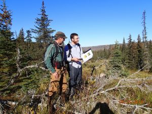 Kachemak Heritage Land Trust's Stewardship Coordinator Rob Roy McGregor and volunteer Mike Mungoven monitor a conservation easement property on the Homer bluff.