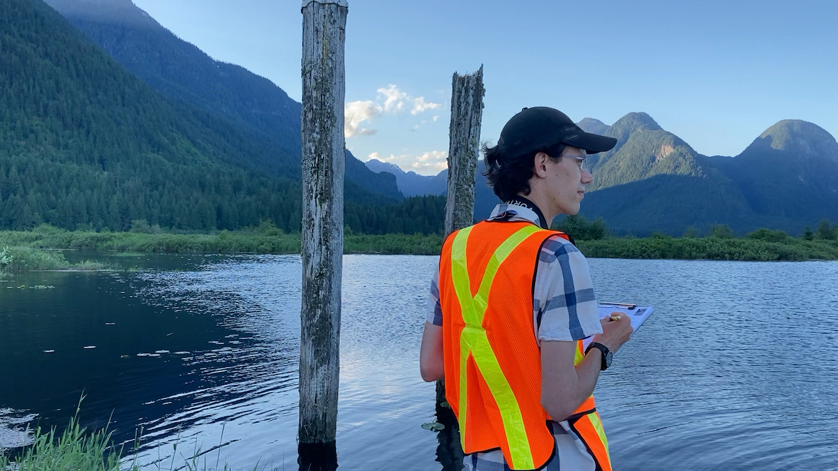 Brendan Toews conducting a bird survey in Widgeon Valley, British Columbia, as part of an ongoing monitoring initative.<br> © Maddie Edmonds