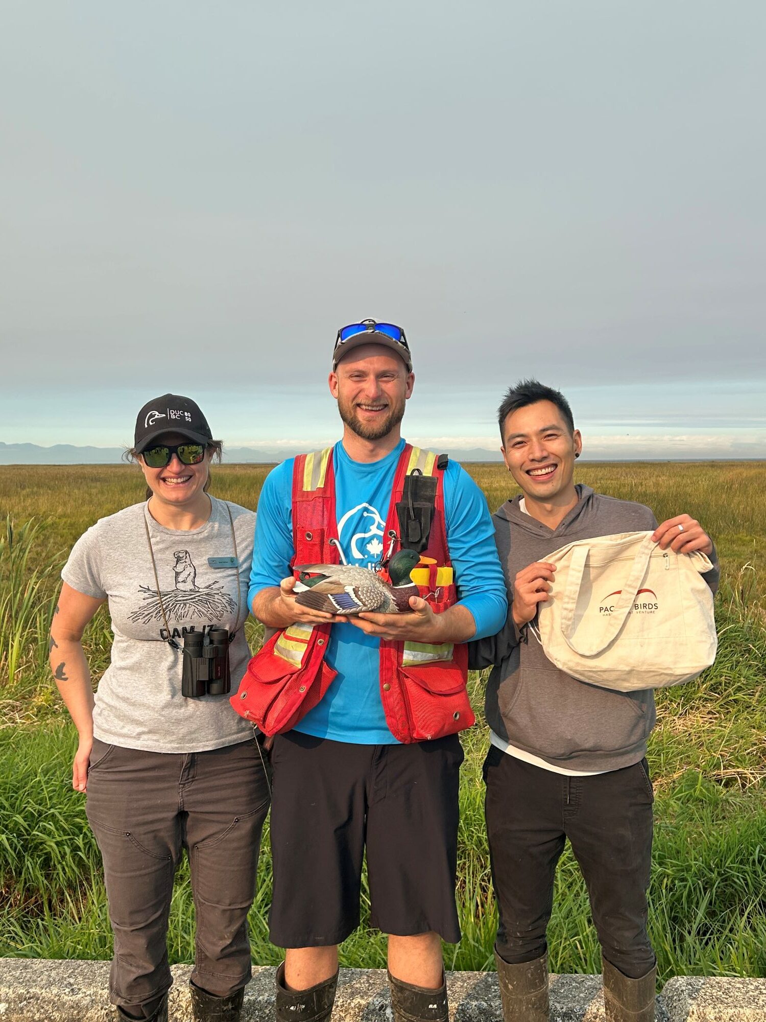 Pacific Birds board member Sarah Nathan, Eric Balke, and Pacific Birds Canadian Coordinator Andrew Huang. <br> Photo: Natalie Myers </br>