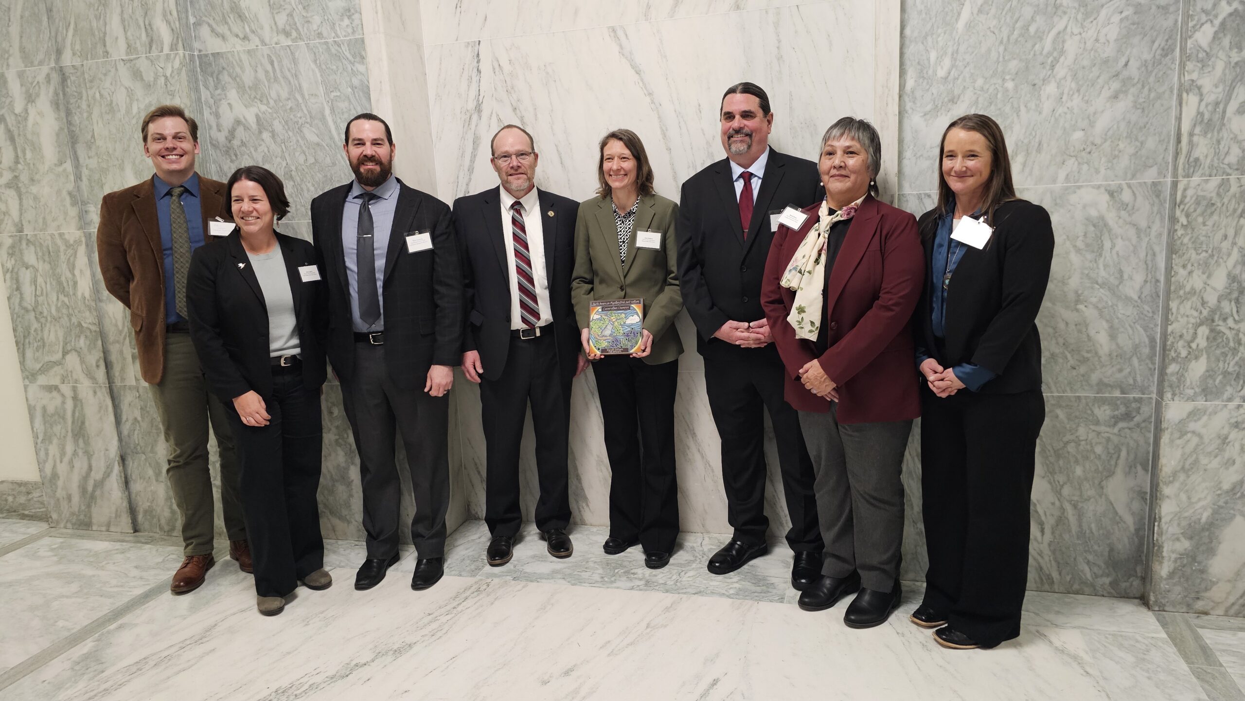 Members of the Klamath Siskiyou Oak Network pose for a photo with the Conservation Champion Award.